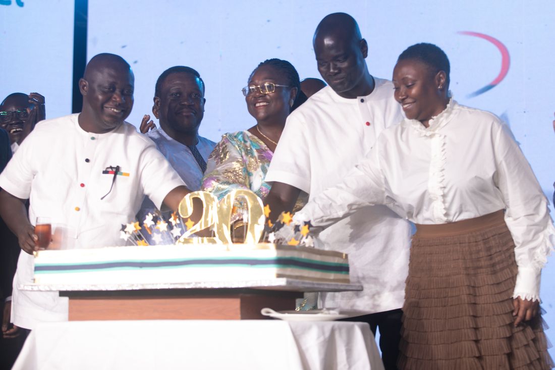 Cutting the 20th anniversary cake together