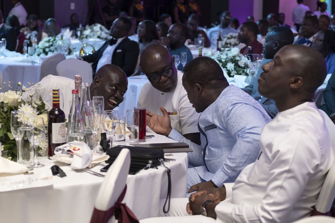 A huddle of conversation at the dinner table